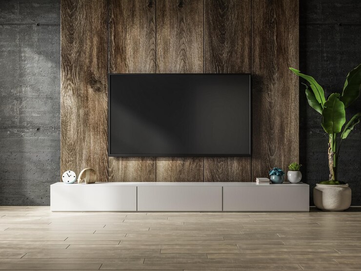 Photo cabinet with wooden wall mounted tv in interior concrete room
