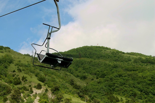 Photo cable car seat cable car in summer