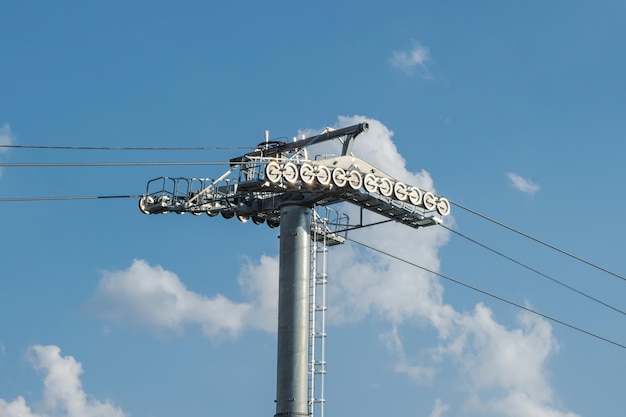 Cable car support wire rope on cloudy sky background