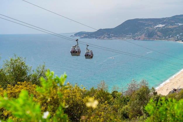 A cable car that is going up to the sea