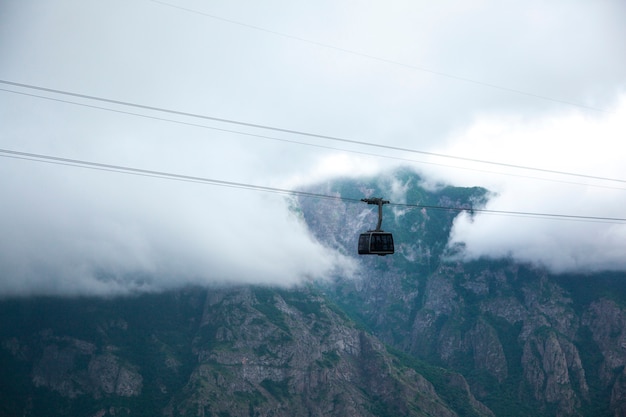 Cable car with fog at high altitude