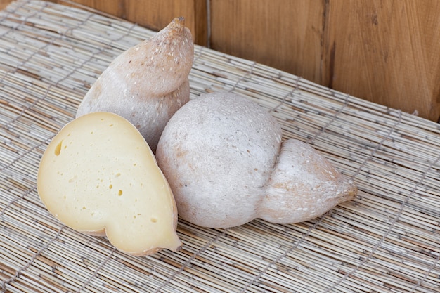 Caciocavallo cheeses, a stretched-curd cheese with teardrop shape Cheese made from cow's milk 