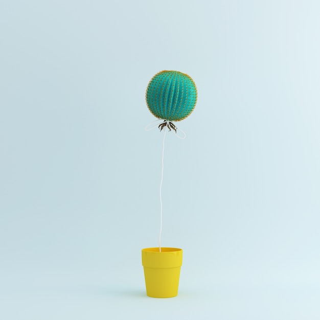 Cactus balloon in Yellow flower pot on pastel blue background