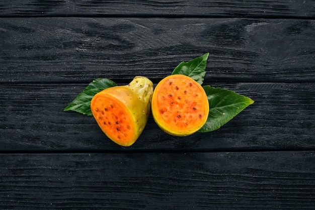 Cactus fruit Tropical Fruits On a wooden background Top view Copy space