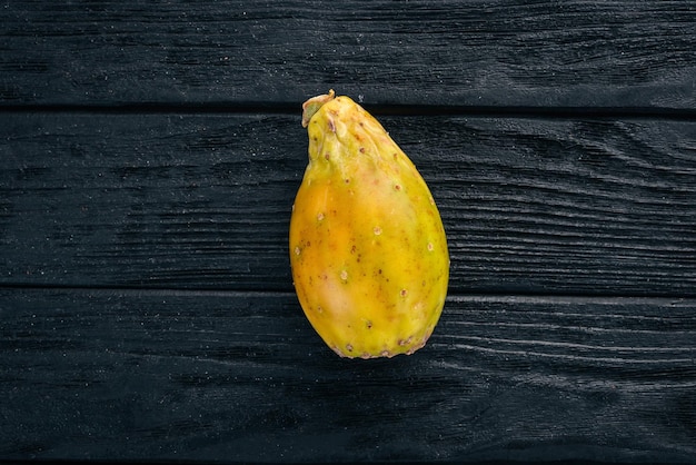 Cactus fruit Tropical Fruits On a wooden background Top view Copy space