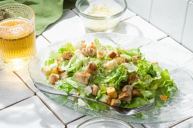 Caesar salad in plate closeup