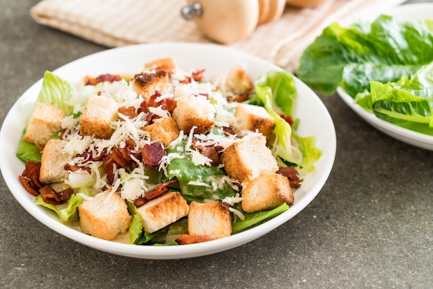 caesar salad on table