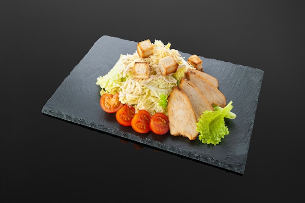 Caesar salad with chicken fillet