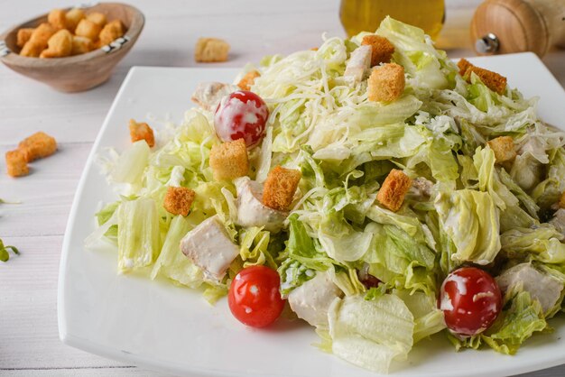 caesar salad with chicken and tomatoes