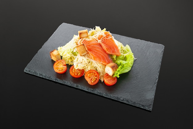 Caesar salad with salmon