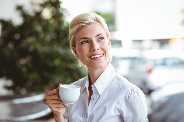  Cafe owner smiling at the camera