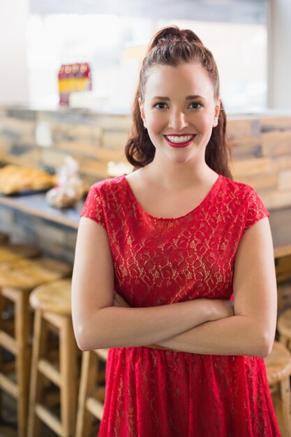 Cafe owner smiling at the camera