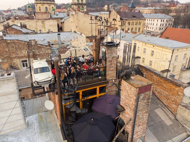 Cafe on rood of building. unusual place to eat