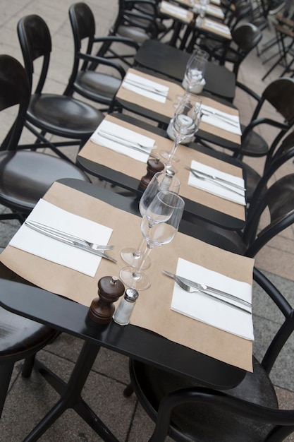 Photo cafe tables and chairs in street