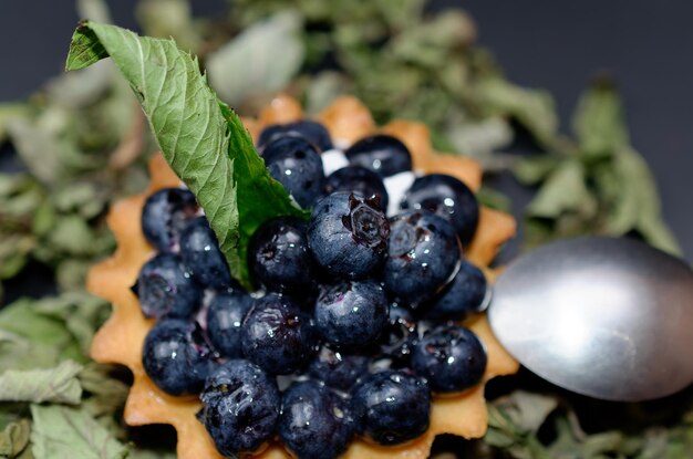 cake basket with blueberries and cream