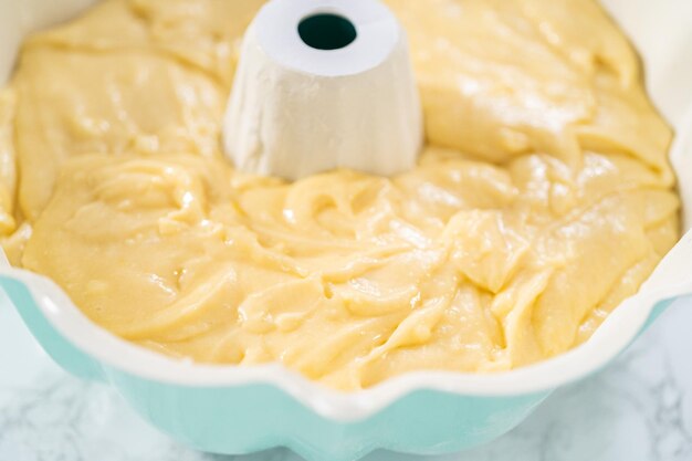 Cake batter in bundt cake pan ready for baking.