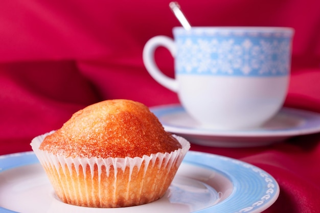 Cake and blue tea cup