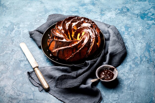 Cake Chocolate Glaze on a blue background.