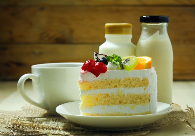 cake and coffee on wood table