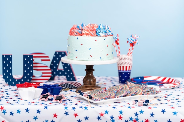 Cake, cookies, and fruit and vegetable snack tray at the July 4th celebration party.