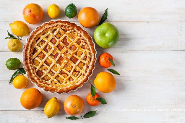 Cake filled with jam and slices of citrus mandarin