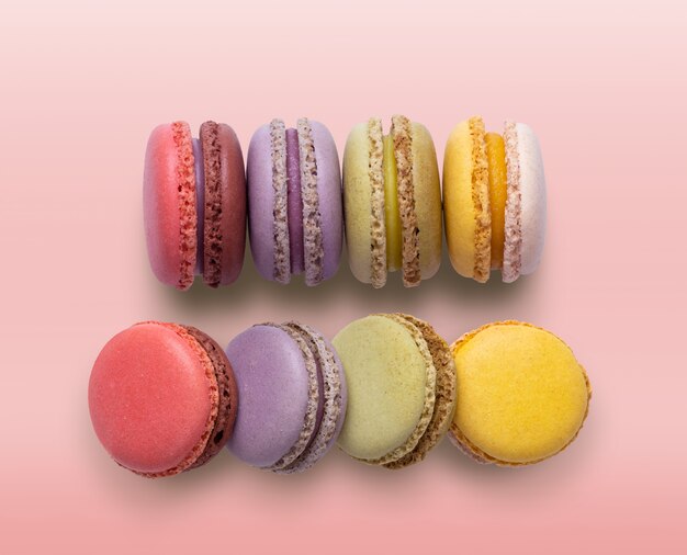 Cake macaron or macaroon on pink background