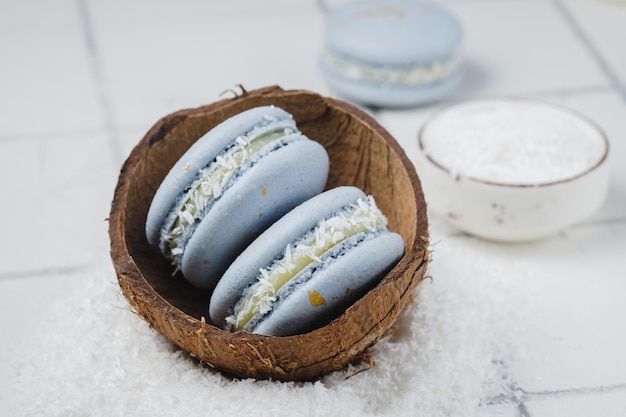 Cake macarons stuffed with coconut and white chocolate Exquisite French dessert for coffee drinking