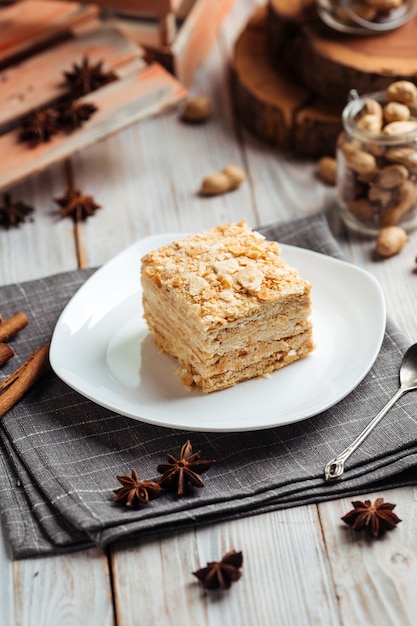 Cake made of thin crispy cakes and cream napoleon