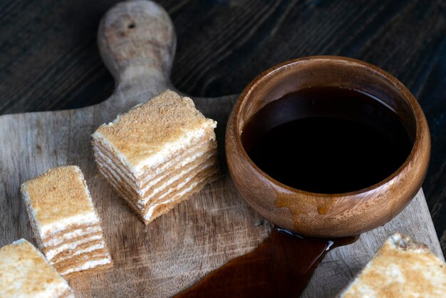 Cake made of thin honey cakes and a thin creamy layer