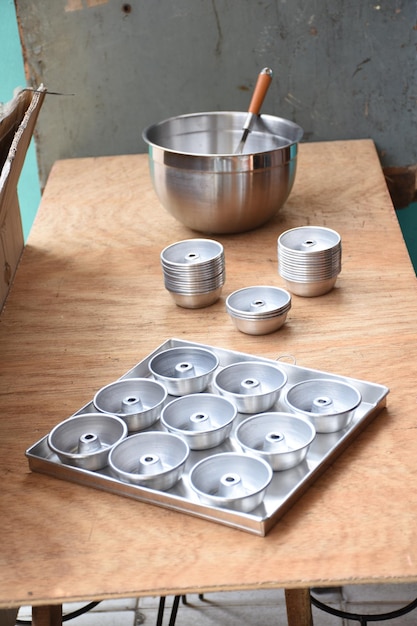 Cake pan on wooden background