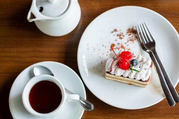 Cake on table with tea dessert relax time