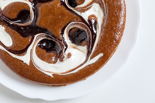 Cake with chocolate filling on a white background