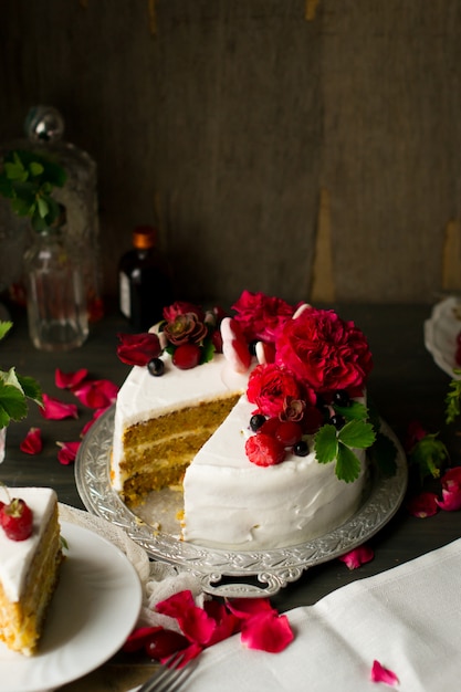 cake with cream and fruits on a plate