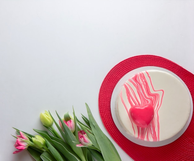 Cake with heart shape and flowers