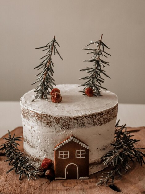 a cake with a house on the top and a house on the top