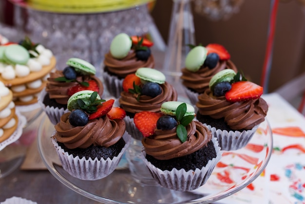 Cakes and sweets with chocolate and berries..