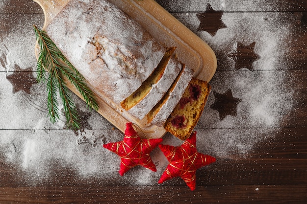 Cakes with powdered sugar on the New Year's table