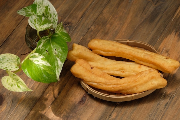Cakwe. Youtiao, known in Southern China as Yu Char Kway is a long golden-brown deep-fried strip.