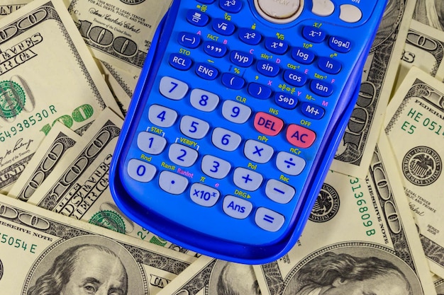 Calculator on the american one hundred dollar bills background