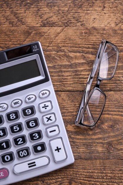 Calculator keypad on a wooden floor