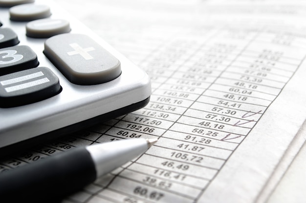 Calculator and stationery items on the table