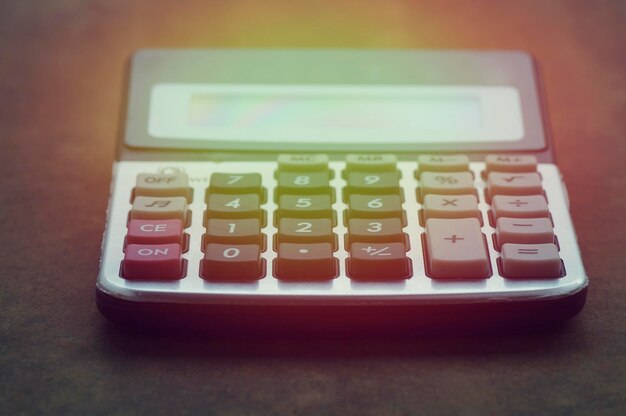 calculator on wood table