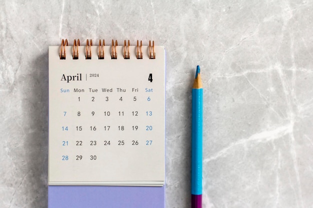 Calendar for April 2024 on a marble background