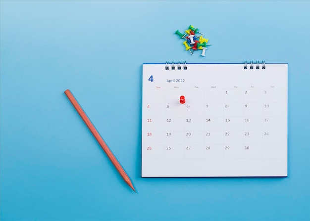 Calendar on a blue background, the concept of planning.