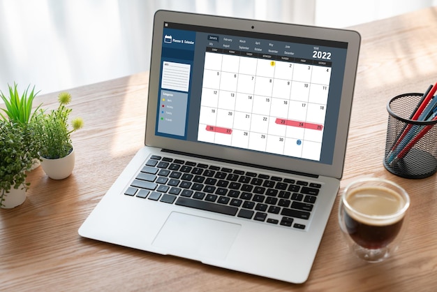 Foto calendario sull'applicazione software per computer per la pianificazione della pianificazione modesta