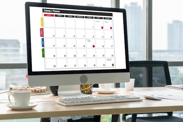 Foto calendario sull'applicazione software per computer per la pianificazione della pianificazione modesta