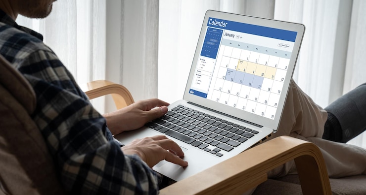 Photo calendar on computer software application for schedule planning snugly
