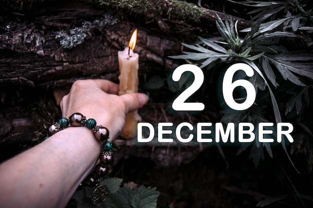 Photo calendar date on the background of an esoteric spiritual ritual december 26 is the twentysixth day of the month