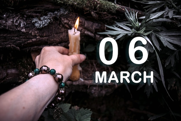 Calendar date on the background of an esoteric spiritual ritual March 6 is the sixth day of the month