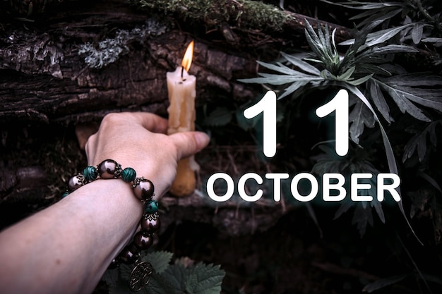 Calendar date on the background of an esoteric spiritual ritual October 11 is the eleventh day of the month